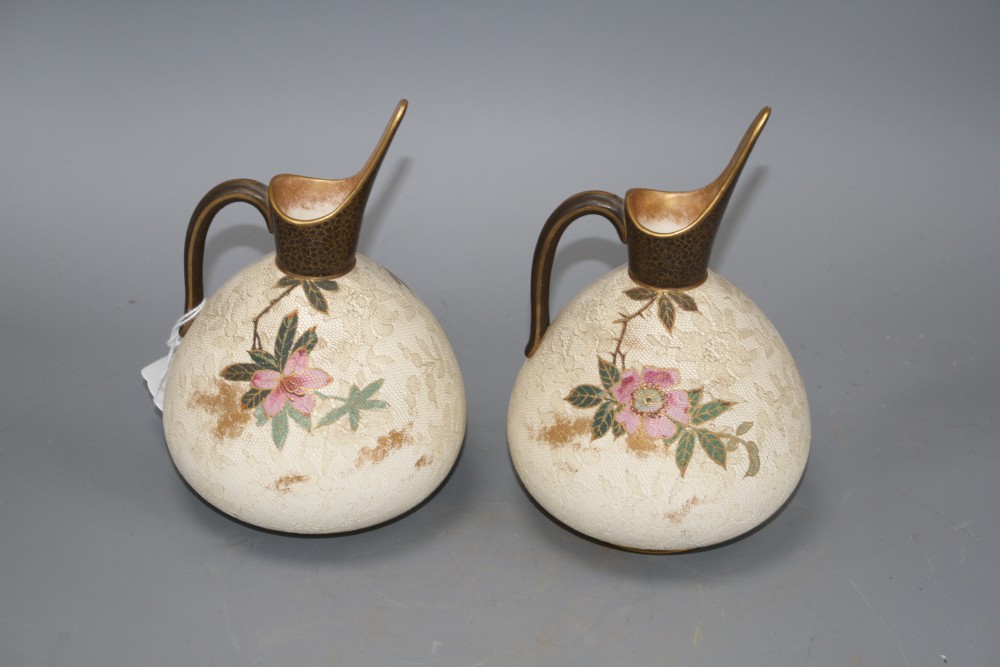 A pair of Doulton Burslem ewers, with floral decoration, US Patent stamp to base, height 17.5cm